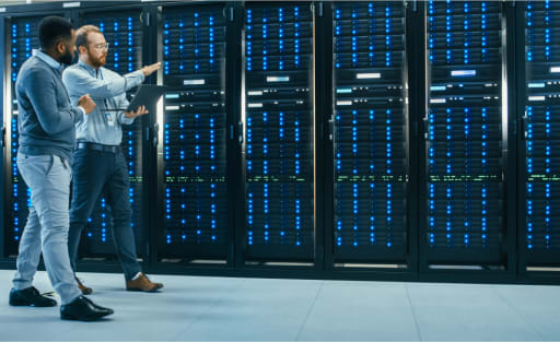 two men in a server room