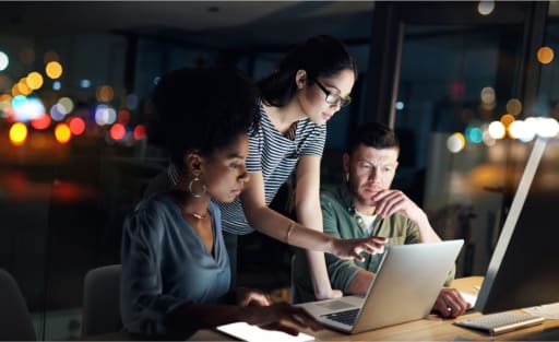 three people work in the office