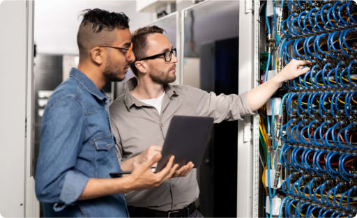 two men in a server room