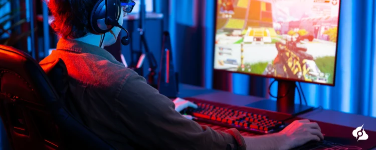 A decorative image showing a man playing multiplayer games.