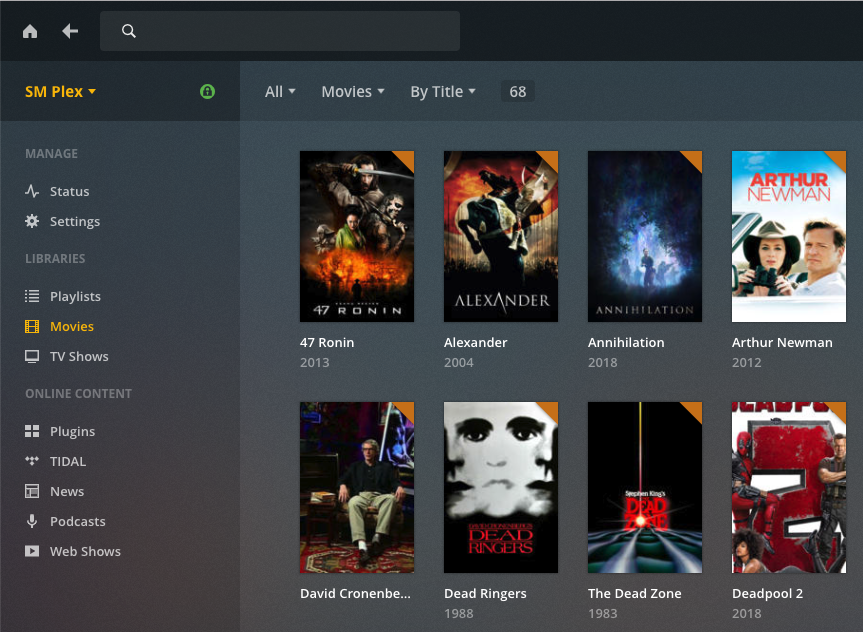 The Plex Media Server interface displays all of the movies and TV shows in a grid, with a thumbnail for each media file.